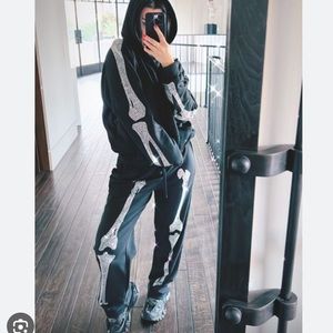 Landon Barker X BoohooMAN skeleton track suit as seen on Kourtney Kardashian